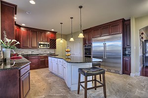 Kitchen with island and cabinets