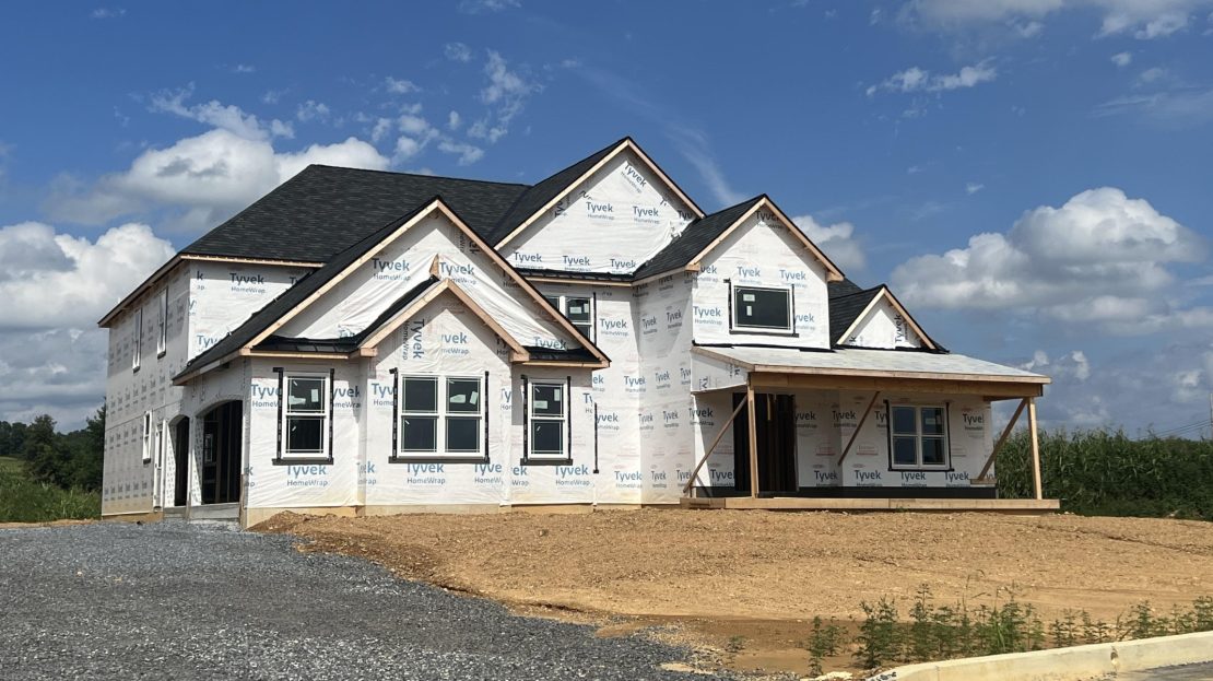 11 Fiorino Way, exterior front - being constructed - slight side photo showing 2 car garage