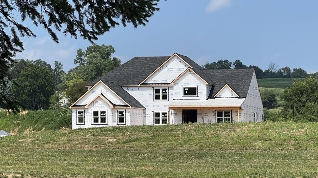 11 Fiorino Way, exterior front - being constructed - showing hills behind property
